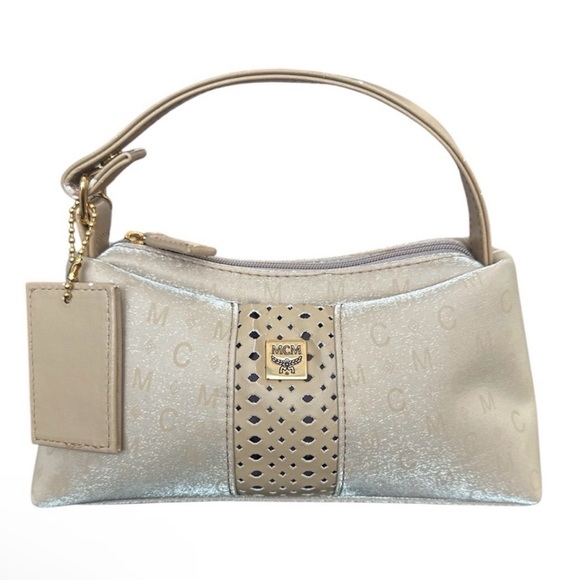 MCM Mini Top Handle Bag
Champagne Monogram Leather - Picture 2 of 15